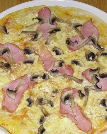 Рецепт пиццы с ветчиной и шампиньонами