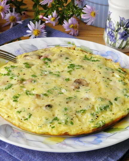 Рецепт омлета с ветчиной, грибами и сыром