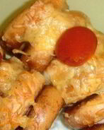 Сосиски в сушках под сырной корочкой